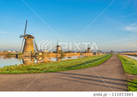Dutch Windmill landscape at Kinderdijk Village Netherlands 111053865