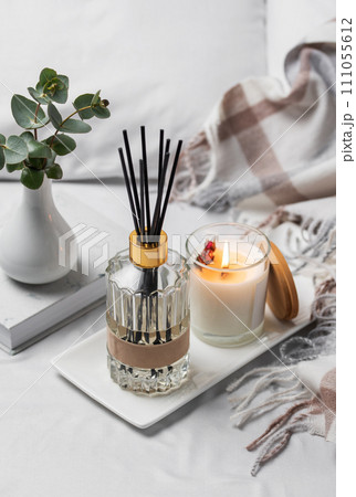Aromatic reed air freshener, eucalyptus leaves and candle Aromatic reed air freshener, eucalyptus leaves and candle 111055612