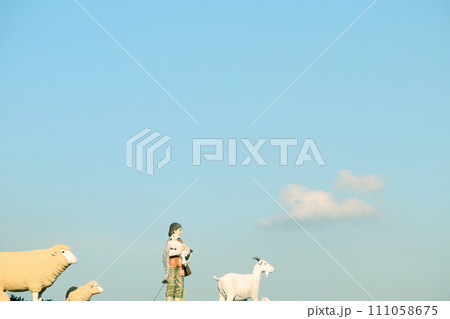 少年と山羊と羊 111058675