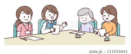 介護保険サービスについて相談している家族 111058842
