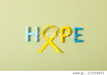 The inscription hope with a yellow ribbon The inscription hope with a yellow ribbon 111059471