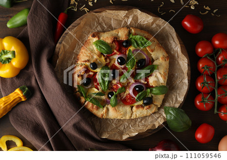 Freshly baked vegetable galette with fresh vegetables Freshly baked vegetable galette with fresh vegetables 111059546