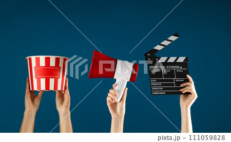 The concept of going to the cinema, in the hands of many women. 111059828