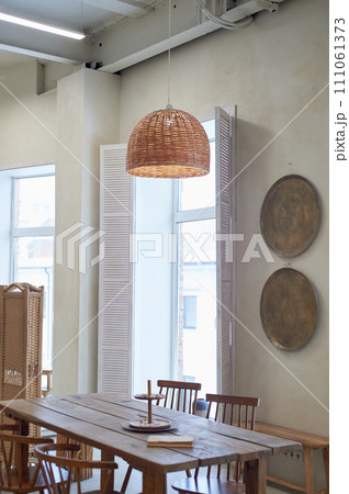 The room is eco-style. Lots of light, straw and wooden accessories. Minimalism and simplicity 111061373