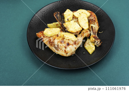 Chicken baked with pineapple. Chicken baked with pineapple. 111061976