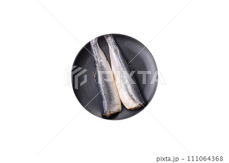 Pacific herring fillet marinated with salt, spices and herbs Pacific herring fillet marinated with salt, spices and herbs 111064368