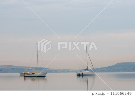 Tbilisi sea, reservoir and boats with deflated sails Tbilisi sea, reservoir and boats with deflated sails 111066249