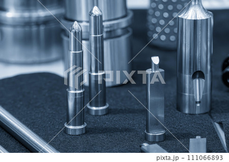 Close up scene the press die and injection mold standard parts. 111066893