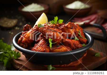 Mouthwatering Tandoori Chicken - Aromatic and Authentic Indian Dish with Traditional Flavors Mouthwatering Tandoori Chicken - Aromatic and Authentic Indian Dish with Traditional Flavors 111069261