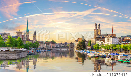 Skyline panorama on the downtown of Zurich and its reflection, Switzerland 111072412