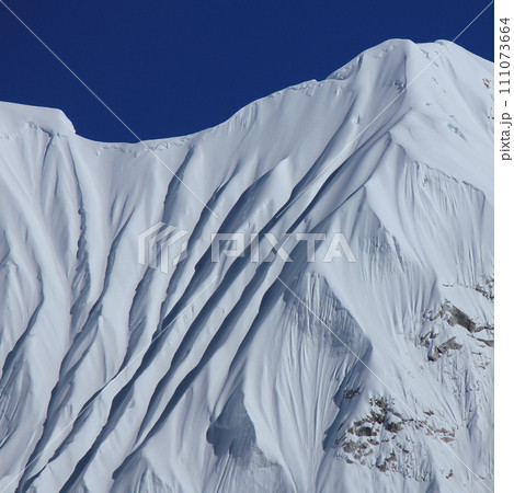 Beautiful textures on a snow covered mountain near Mount Everest, Nepal. Beautiful textures on a snow covered mountain near Mount Everest, Nepal. 111073664