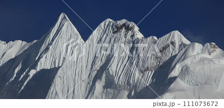 Sharp mountain ridge and peak seen from Gorakshep, Nepal. 111073672