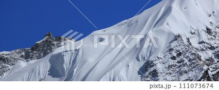 Detail of a snow covered glacier and peak  near Gorak Shep, Nepal. 111073674