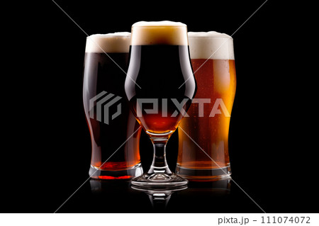 Set of Beer glasses on a black background. Mugs with drink like Ipa, Pale Ale, Pilsner, Porter or Stout Set of Beer glasses on a black background. Mugs with drink like Ipa, Pale Ale, Pilsner, Porter or Stout 111074072