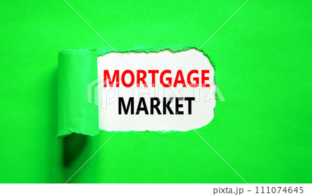 Mortgage market symbol. Concept words Mortgage market on beautiful white paper. Beautiful green paper background. Business mortgage market concept. Copy space. Mortgage market symbol. Concept words Mortgage market on beautiful white paper. Beautiful green paper background. Business mortgage market concept. Copy space. 111074645