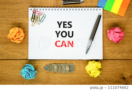 Motivational Yes you can symbol. Concept words Yes you can on beautiful white note. Beautiful wooden background. Black pen. Colored paper. Business motivational and Yes you can concept. Copy space Motivational Yes you can symbol. Concept words Yes you can on beautiful white note. Beautiful wooden background. Black pen. Colored paper. Business motivational and Yes you can concept. Copy space 111074662