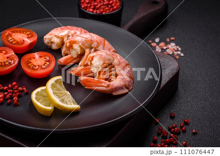 Delicious shrimp or langoustine tails boiled with salt and spices Delicious shrimp or langoustine tails boiled with salt and spices 111076447