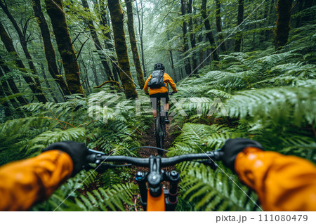 Athlete biking in the mountains Athlete biking in the mountains 111080479