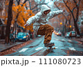 A person skateboarding on the road 111080723