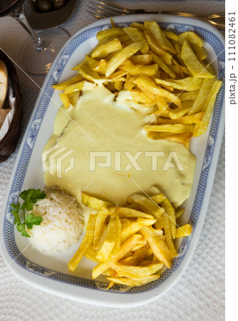 Veal steak with cream sauce 111082461
