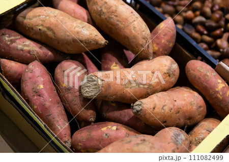 Raw sweet potatoes for sale 111082499
