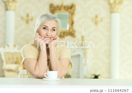 Portrait of beautiful happy woman at home 111084267