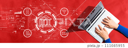 Online banking concept with person using a laptop Online banking concept with person using a laptop 111085955