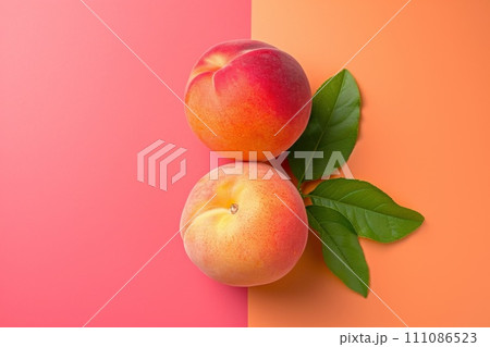 two peaches laid out on a background of bright brights 111086523