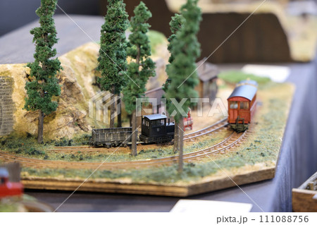 Nov 26 2023 Set of model railway locomotive and layout with a station Nov 26 2023 Set of model railway locomotive and layout with a station 111088756