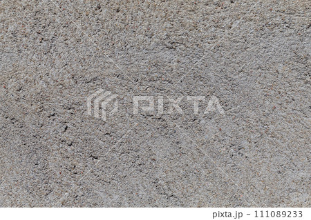 Crushed granite stones wall - close up 111089233