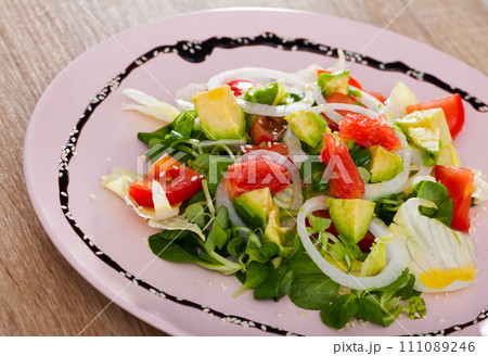 Salad from avocado, tomatoes, grapefruit and cornsalad Salad from avocado, tomatoes, grapefruit and cornsalad 111089246