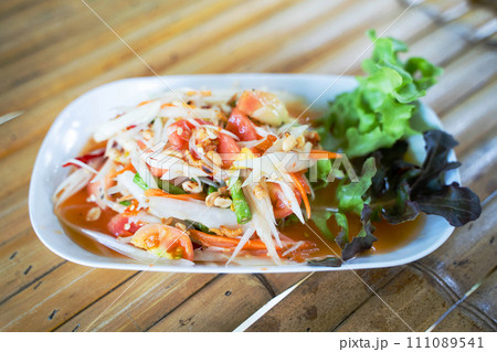 Som Tum - Spicy papaya salad Thai food,papaya salad Som Tum - Spicy papaya salad Thai food,papaya salad 111089541