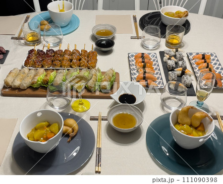 Japanese sushi food, Maki ands rolls with tuna, salmon, shrimp, crab and avocado Japanese sushi food, Maki ands rolls with tuna, salmon, shrimp, crab and avocado 111090398
