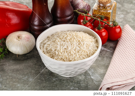 Raw delicous basmati rice heap Raw delicous basmati rice heap 111091627