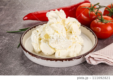 Soft Philadephia cheese in the bowl 111092821