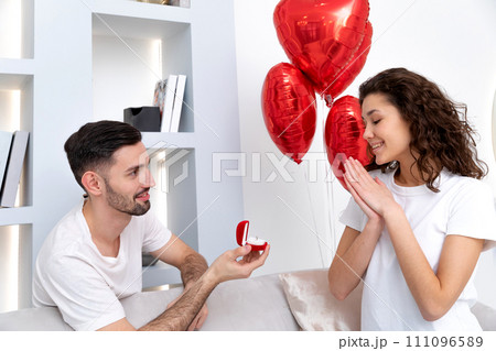 Man makes a proposal at the Valentines day celebration Man makes a proposal at the Valentines day celebration 111096589