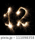 Sparkling numbers on a dark background 111098358
