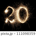 Sparkling numbers on a dark background 111098359