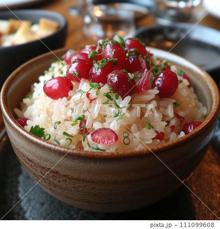 cooked rice with cranberries in a plate 111099608
