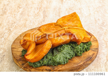 Smoked squid appetizer snack isolated Smoked squid appetizer snack isolated 111100961