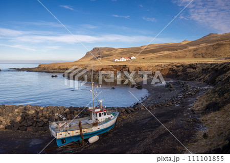 Abandoned boat beside the fjord, Bakkagerdi, Iceland 111101855
