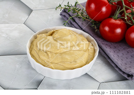 Dijon mustard sauce in the bowl Dijon mustard sauce in the bowl 111102881
