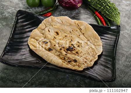 Indian traditional tandori bread - Roti Indian traditional tandori bread - Roti 111102947