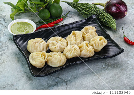 Nepali steamed dumplings  Momo with sause 111102949