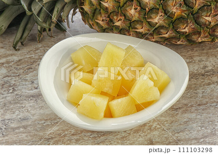 Marinated pineapple slices in the bowl Marinated pineapple slices in the bowl 111103298