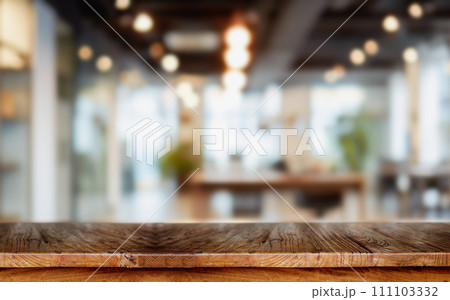 Table with blurred background of corporate office conference room with glass interior for office product. Table with blurred background of corporate office conference room with glass interior for office product. 111103332
