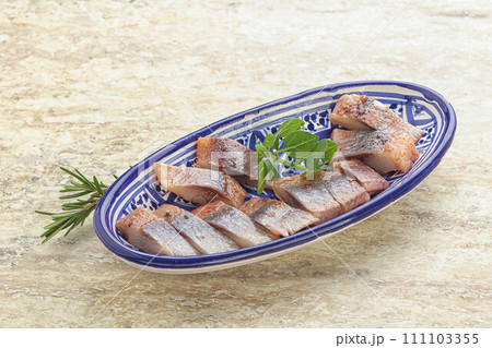 Delicous sliced herring fillet in grape sauce Delicous sliced herring fillet in grape sauce 111103355