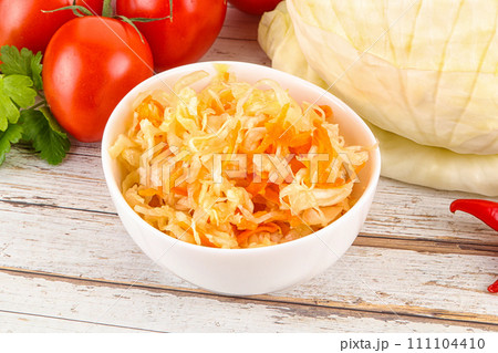 Fermented cabbage sauerkraut in the bowl Fermented cabbage sauerkraut in the bowl 111104410