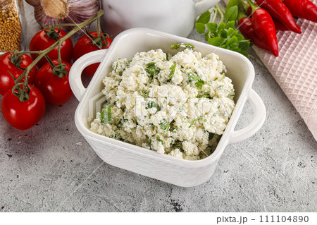 Curd cheese with green herbs 111104890