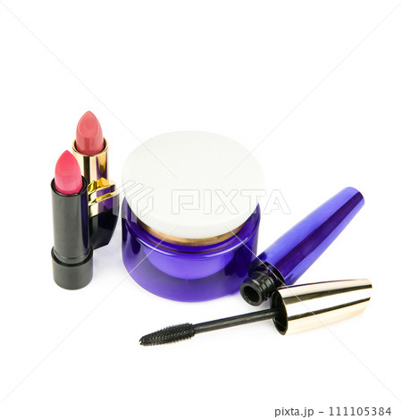 Lipstick, mascara and cosmetic face cream isolated on white . Lipstick, mascara and cosmetic face cream isolated on white . 111105384